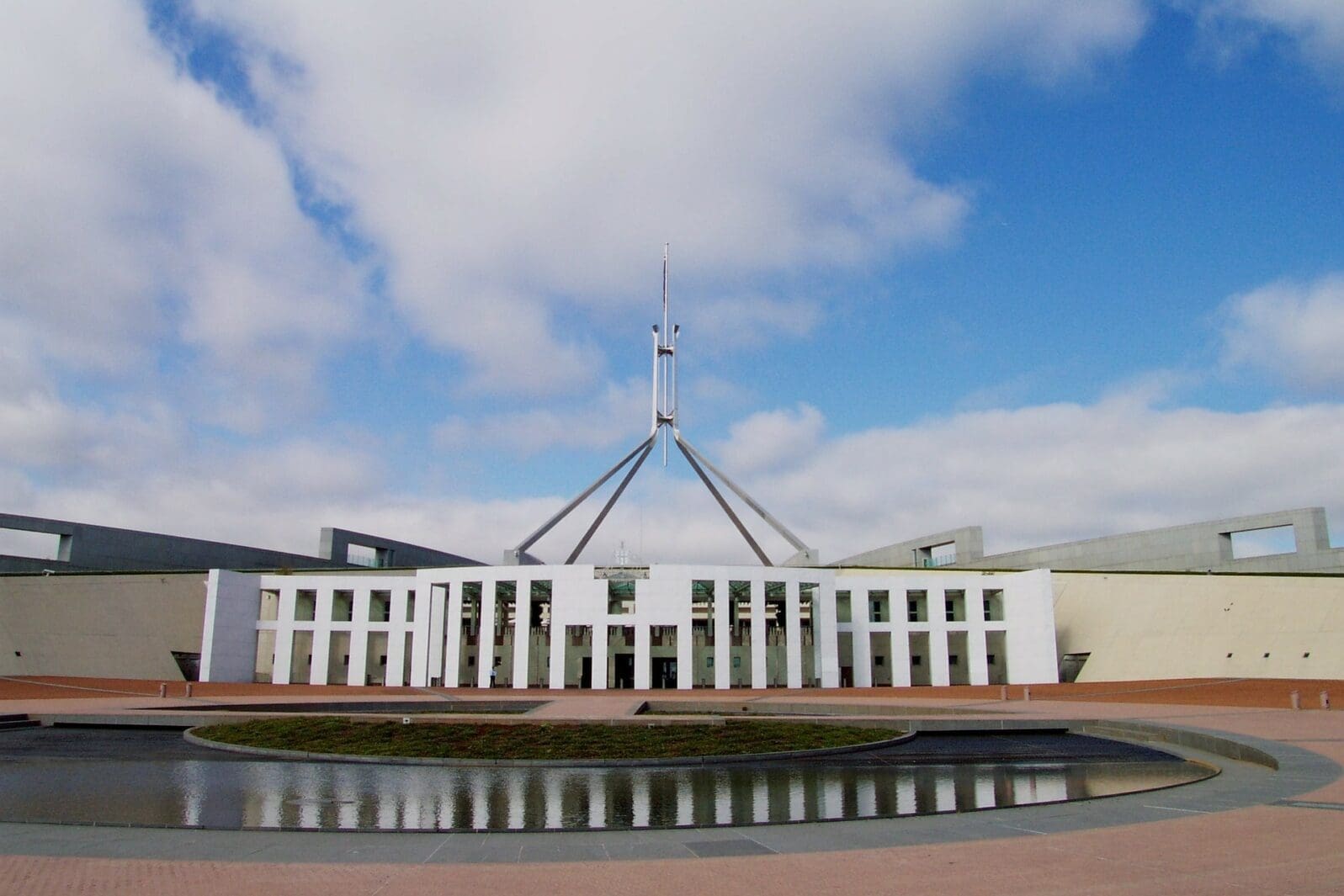 Image of Parliament House. Experts delivered advice to inform a parliamentary inquiry into long COVID.