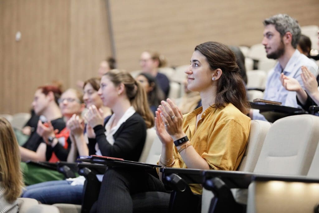 The audience applauds at the 2019 Life as a Clinician-Scientist WA symposium.