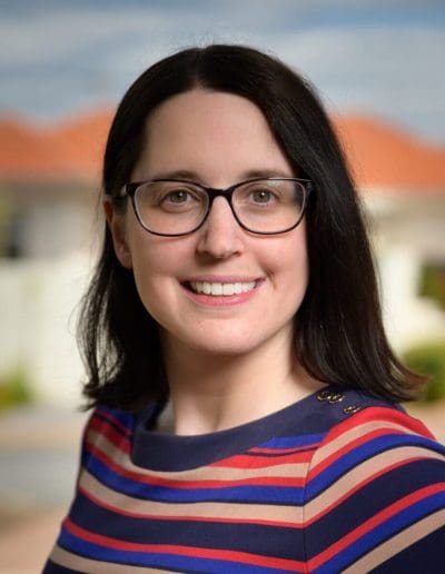 Gemma Smart  is NHMRC Early Career Senior Research Fellow in the Monash Alfred Psychiatry Research Centre (MAPrc) at Monash University, I'd like to her posing with a Barbie as she holds a Barbie up in lectures to illustrate the 'ideal' genital formation. The Age. Pic Ben Searcy 2021